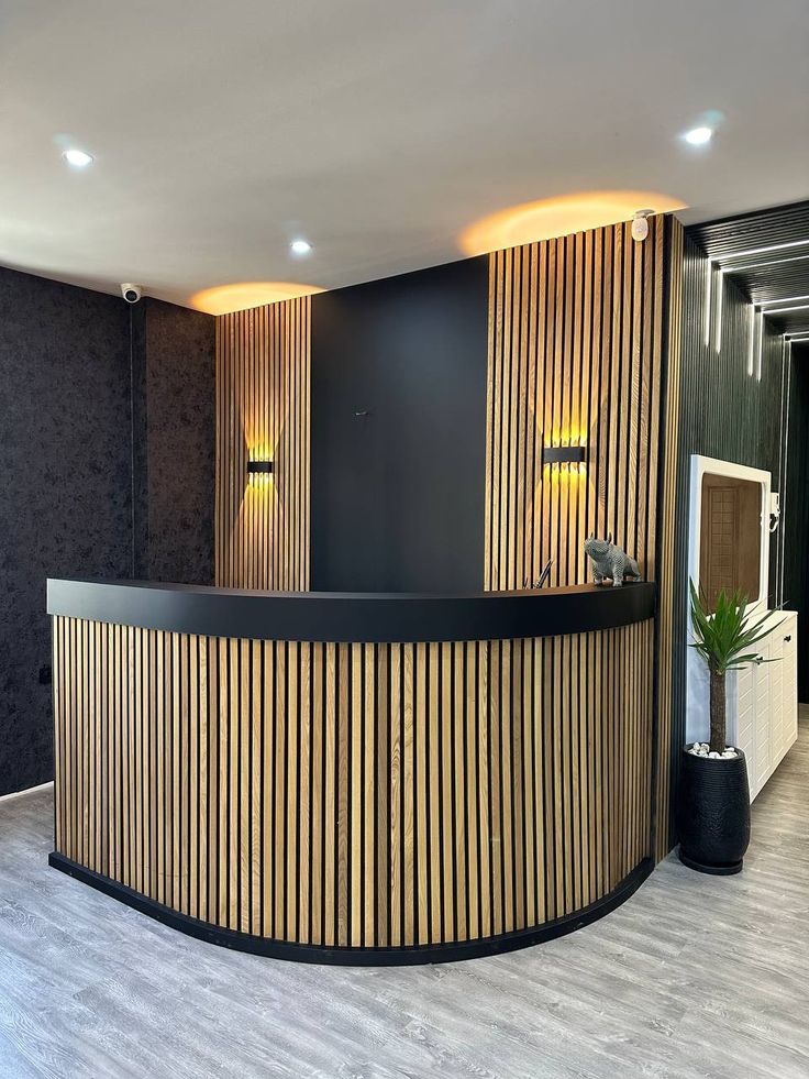Curved black reception desk